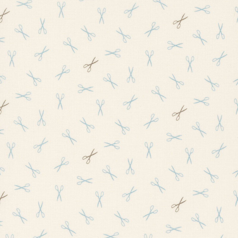 Repeating pattern of blue and green scissors on a light beige fabric.