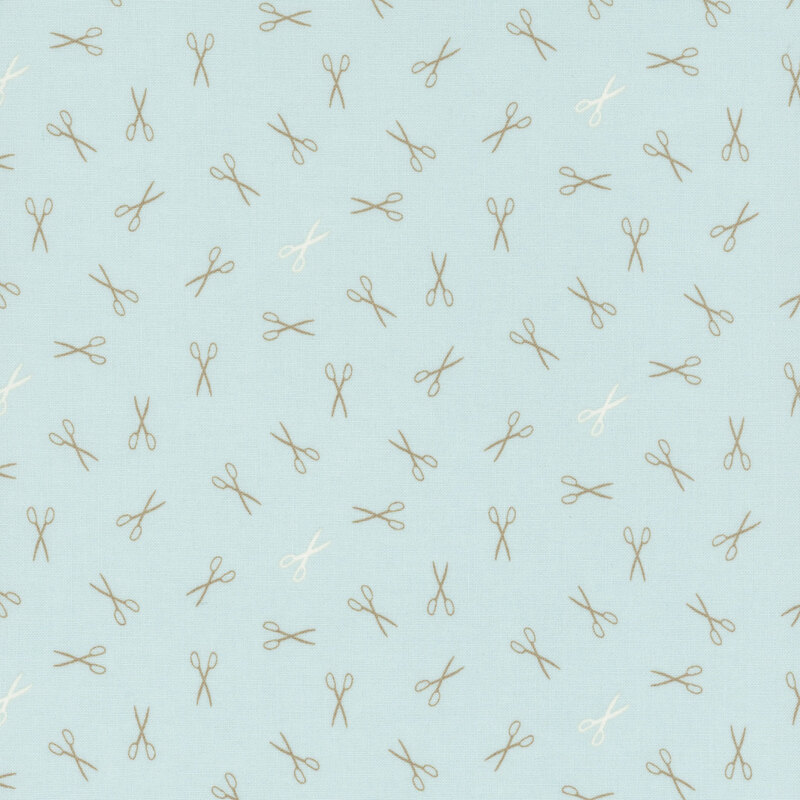 Pattern of variously sized scissors in a light aqua fabric.