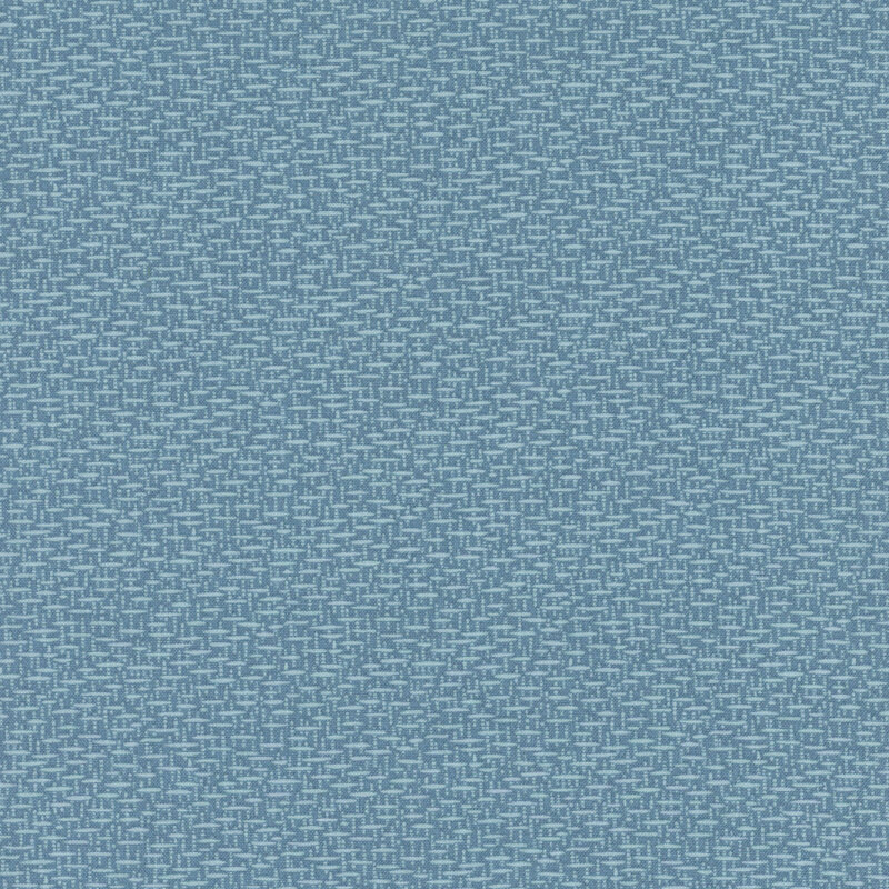 Abstract blue fabric pattern with small intersecting lines creating a woven appearance.