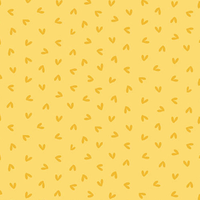 A repeating fabric pattern of small yellow hearts on a light yellow background.