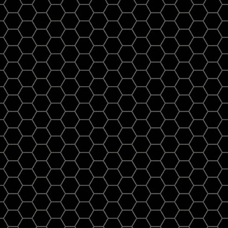 Fabric honeycomb pattern on a black background, creating a geometric design.