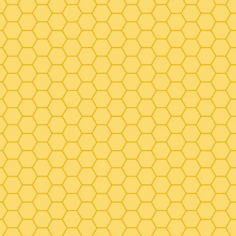 Honeycomb pattern fabric in shades of yellow with outlined hexagonal shapes.