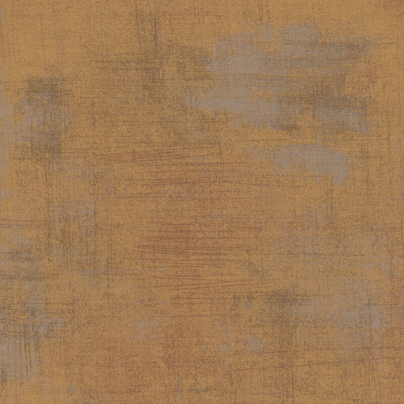 Dark tan fabric with bits of grey grunge texturing