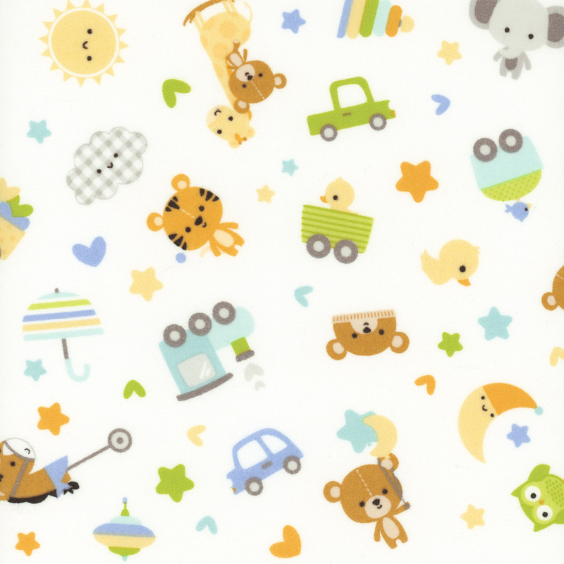 White fabric with tossed stuffed animals, pull toys, and hearts and stars.