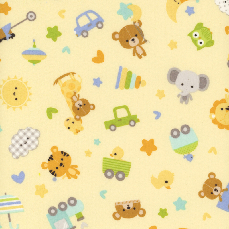 Pastel yellow fabric with tossed stuffed animals, pull toys, and hearts and stars.
