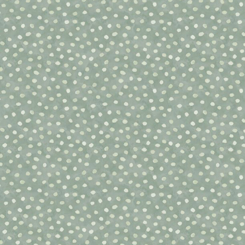 Light green fabric with a repeating pattern of small tonal dots.