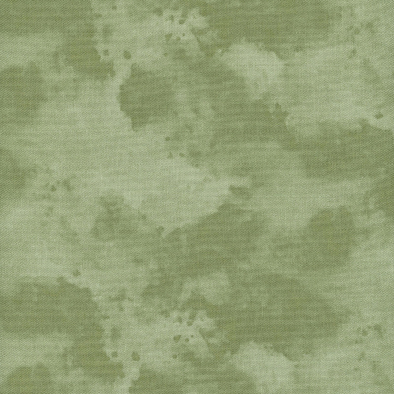 Soft, mottled green fabric with watercolor-like splashes and gradients.