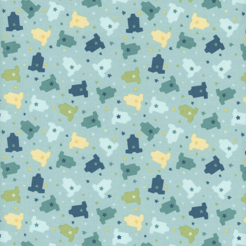 Fabric featuring a pattern of onesies in varying colors on a light blue background with stars.