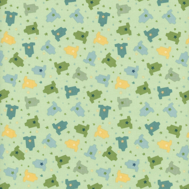 Fabric featuring a pattern of onesies in varying colors on a pastel green background with stars.