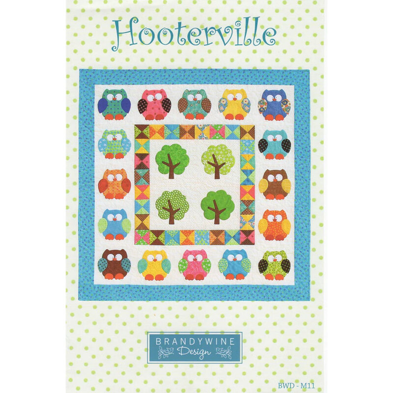 Colorful quilt pattern featuring owls and trees, titled Hooterville by Brandywine Design.