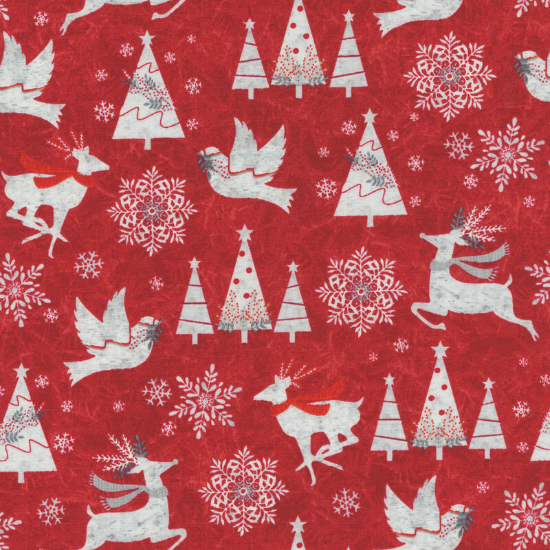 Red fabric with frolicking scarved deer, flying doves, snowflakes, and decorated snowy trees on a tonal frost background.