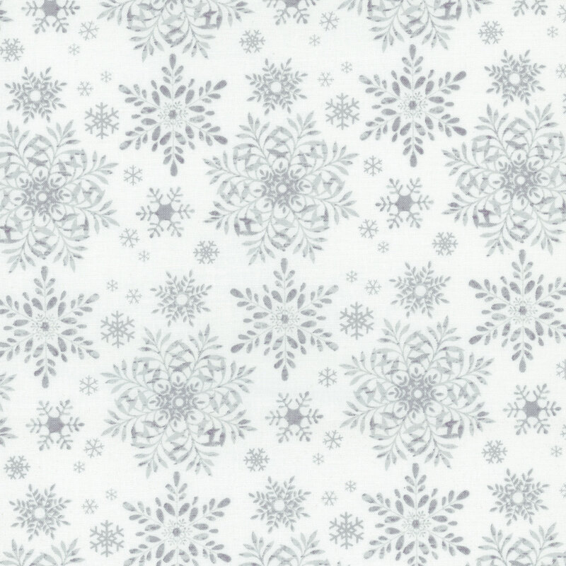 Crisp white fabric with a gray snowflake pattern in varying sizes.