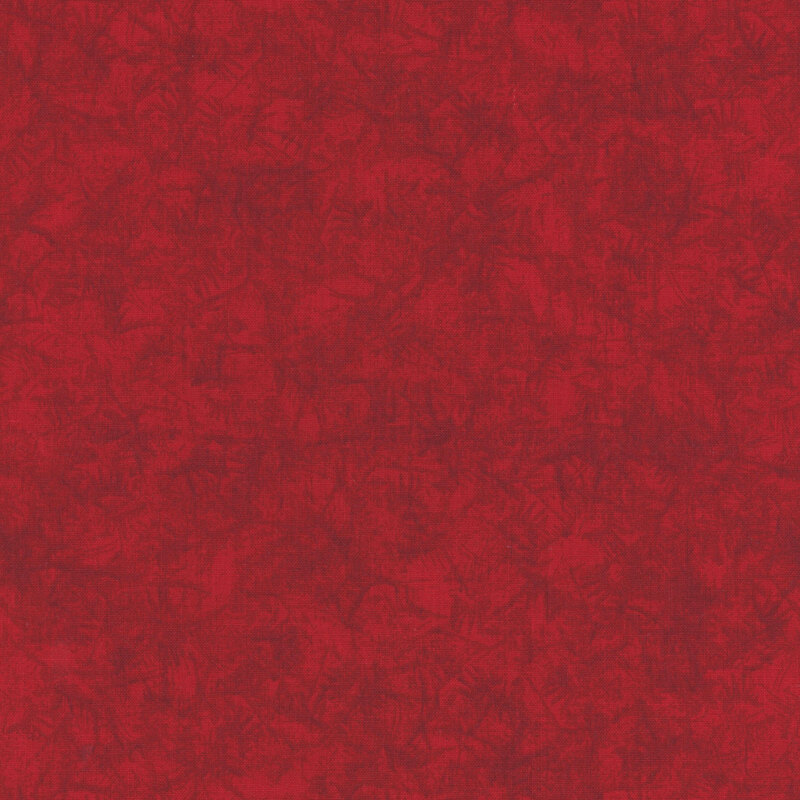 Red fabric with a tonal pattern resembling frost on glass.