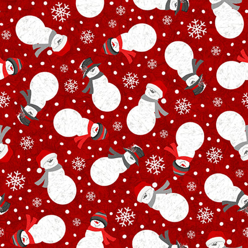 Maroon fabric with tossed snowflakes and snowmen dressed in winter wear on a tonal frost background.