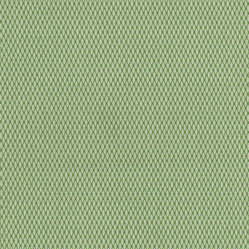A textured pattern of green diamonds on a light green fabric.