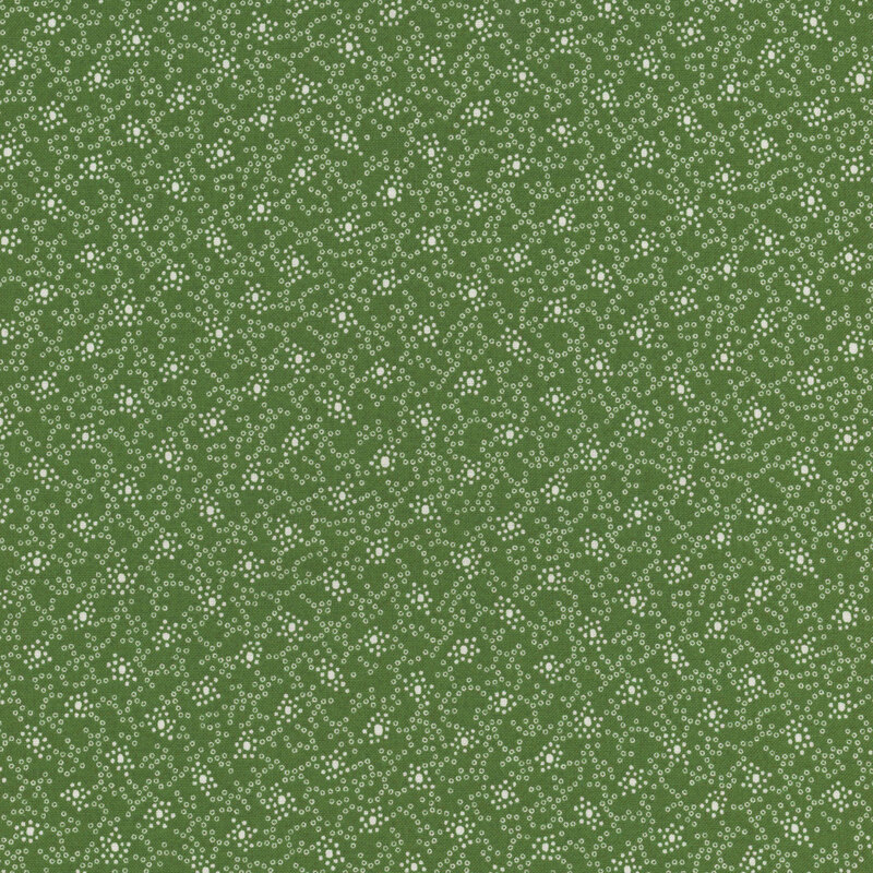 An abstract green textured fabric with a repetitive white floral pattern.