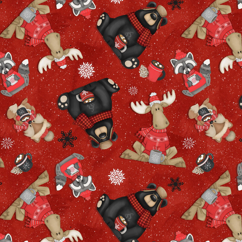 Cherry red fabric with tossed bears, moose, raccoons, and foxes on a paint-flecked background.