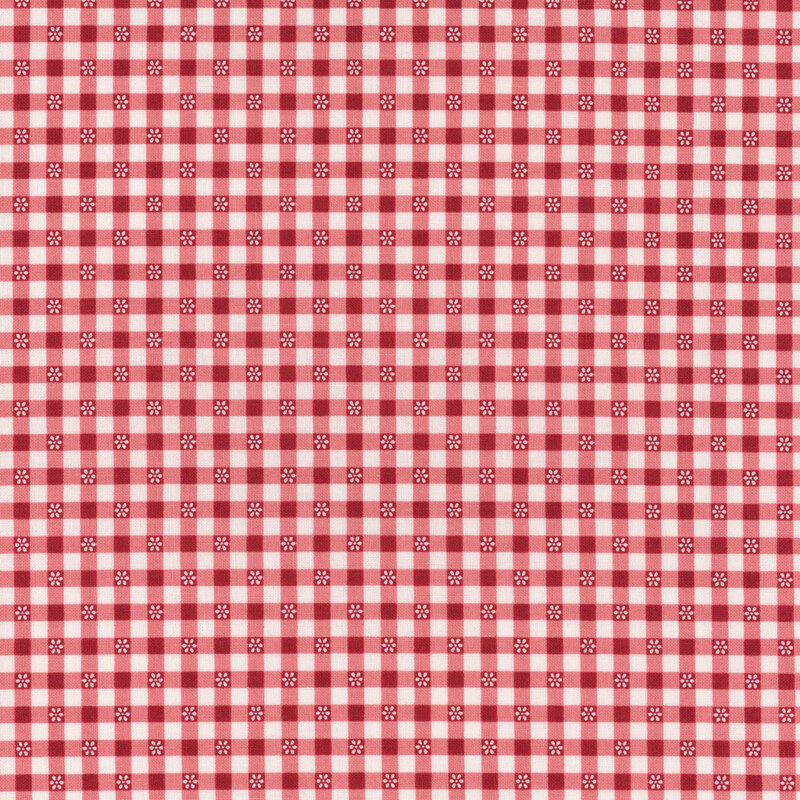 Red and white gingham fabric pattern with small flowers in alternating squares.