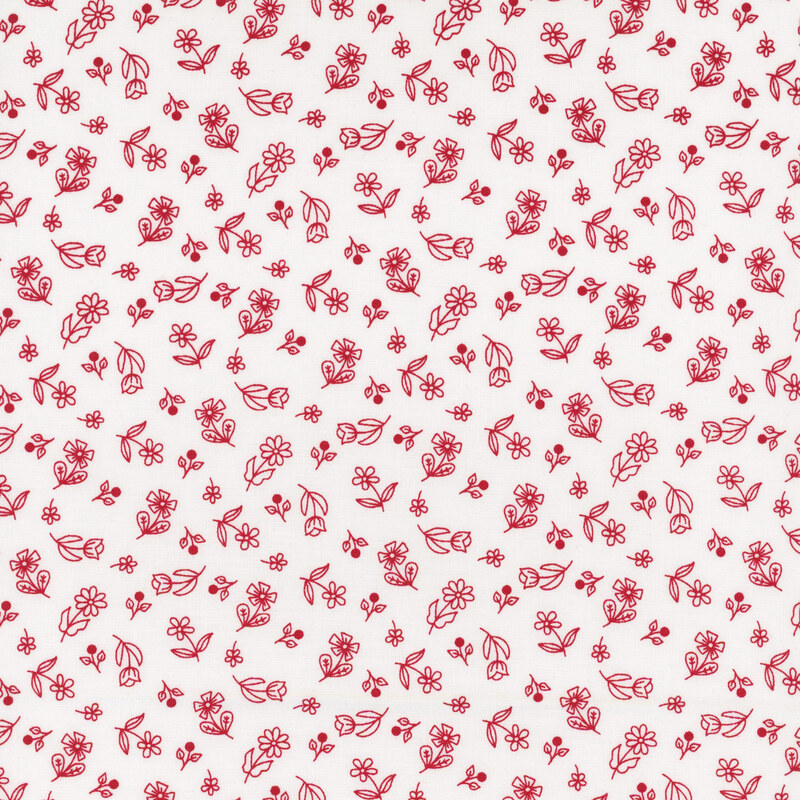 Fabric with a red floral pattern on a white background, featuring various small flowers and leaves.