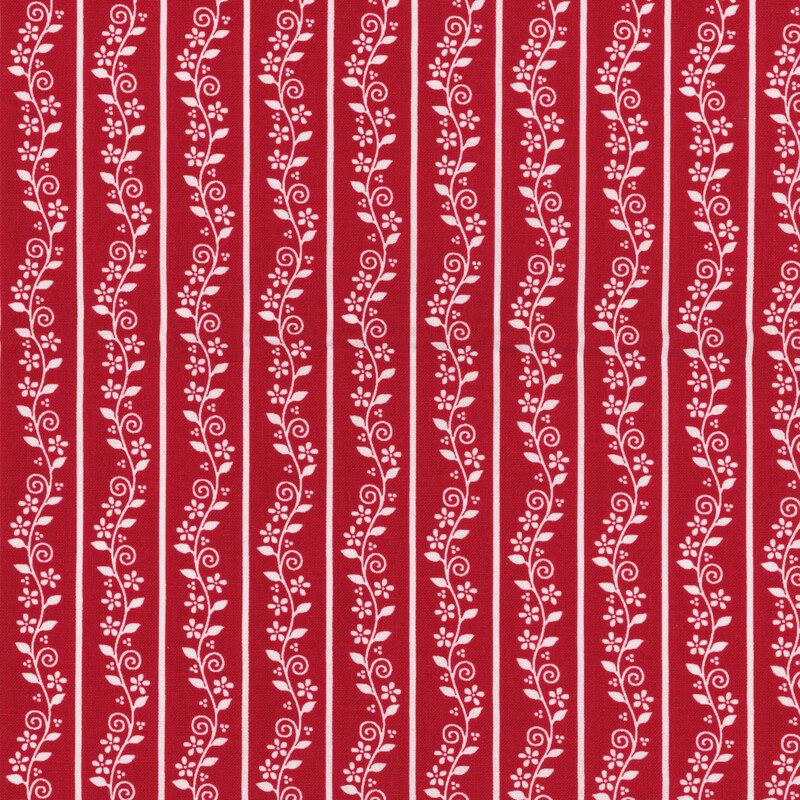 Fabric with a repeated stripe design featuring white stripes and florals against a red background.