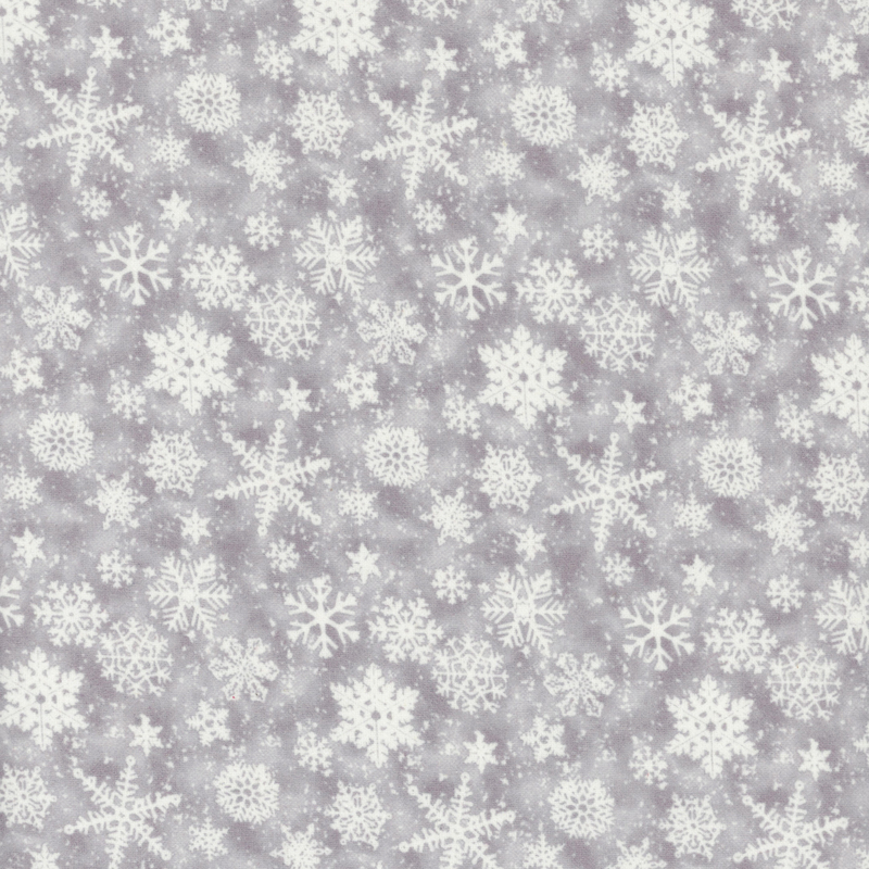 White snowflakes of various shapes and sizes scattered on a light gray mottled background.
