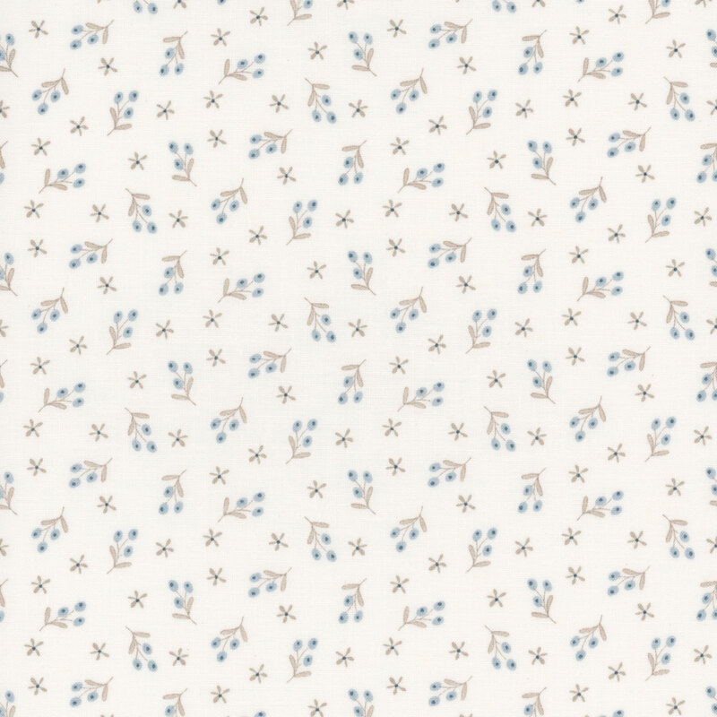 fabric pattern of tiny blue berries and flowers on a cream background