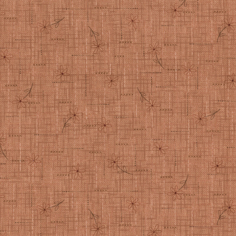fabric pattern of wildflowers on a soft rose background