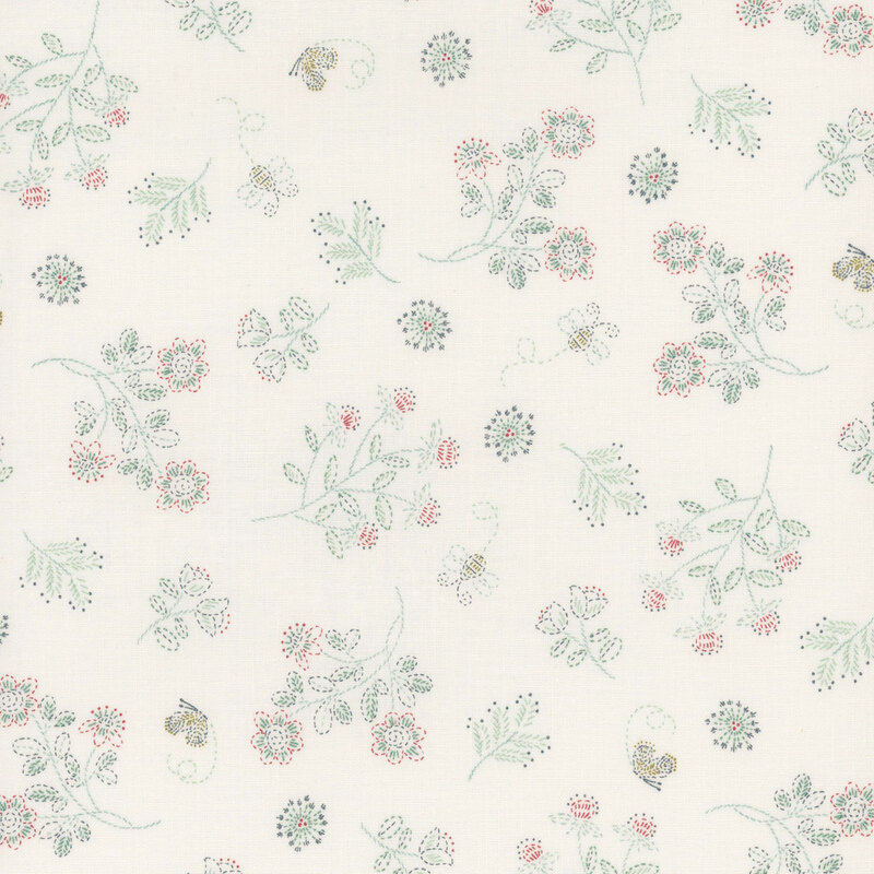 fabric features wildflowers and tiny blooms on a white background