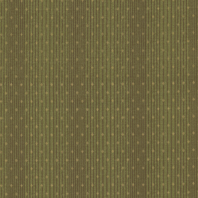fabric pattern of diamond shapes and dark lines over a green background