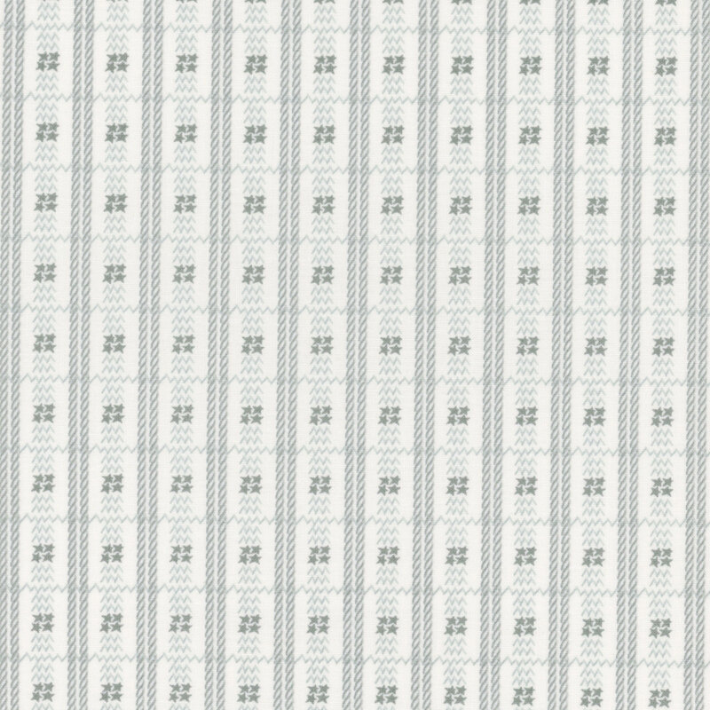 fabric of classic glen plaid pattern on a cream background