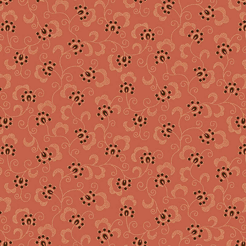 floral and berry fabric pattern on a burnt pink background