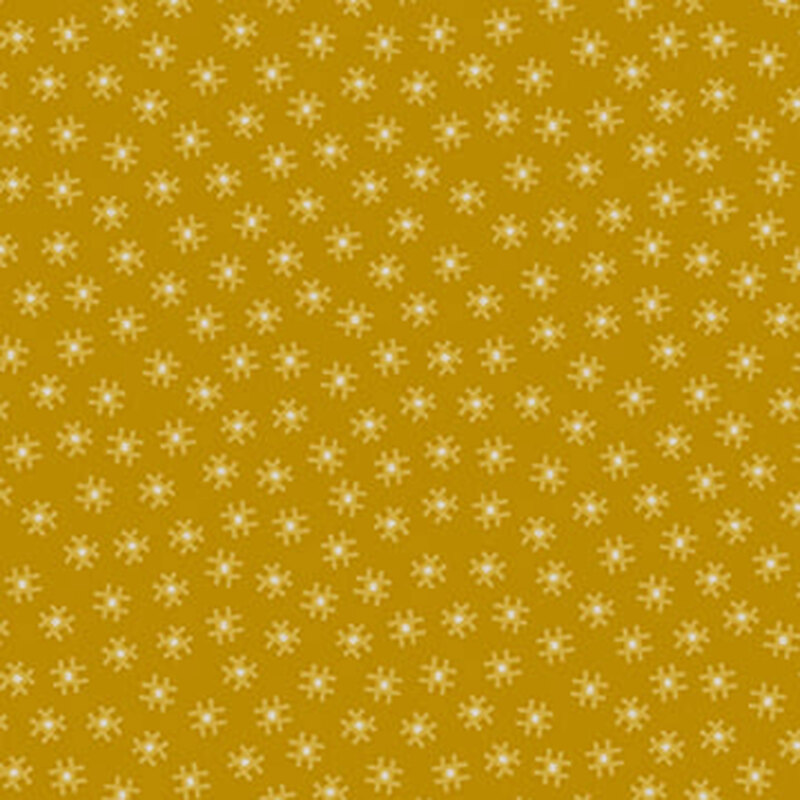 a fabric pattern of small motifs on a burnt yellow background