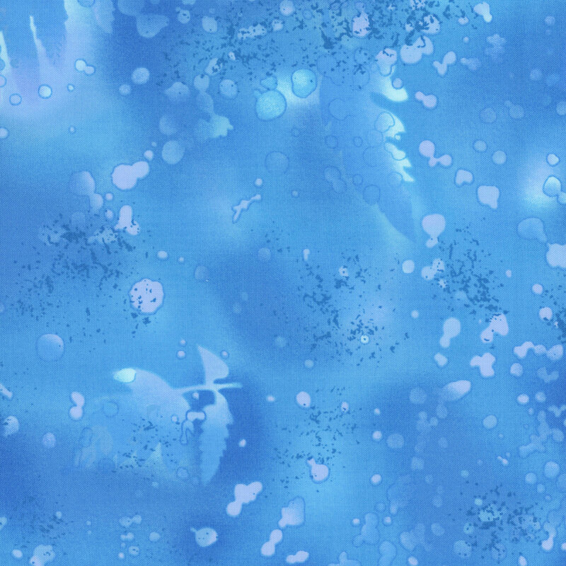 Blue fabric on a watercolor background with complementary mottling and abstract fern designs.