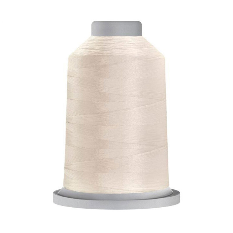 A spool of cream Glide Machine Embroidery Thread