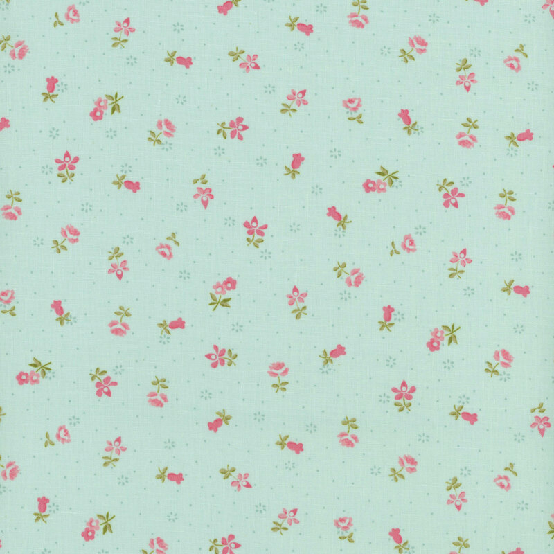Blue fabric with scattered small floral patterns in shades of pink and green.