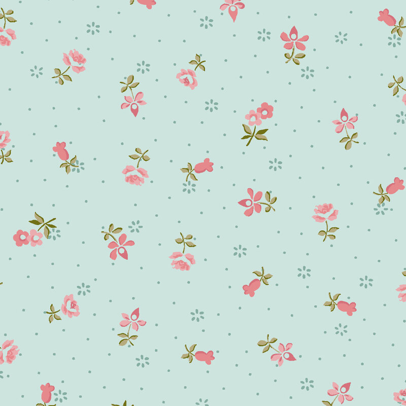 Blue fabric with scattered small floral patterns in shades of pink and green.