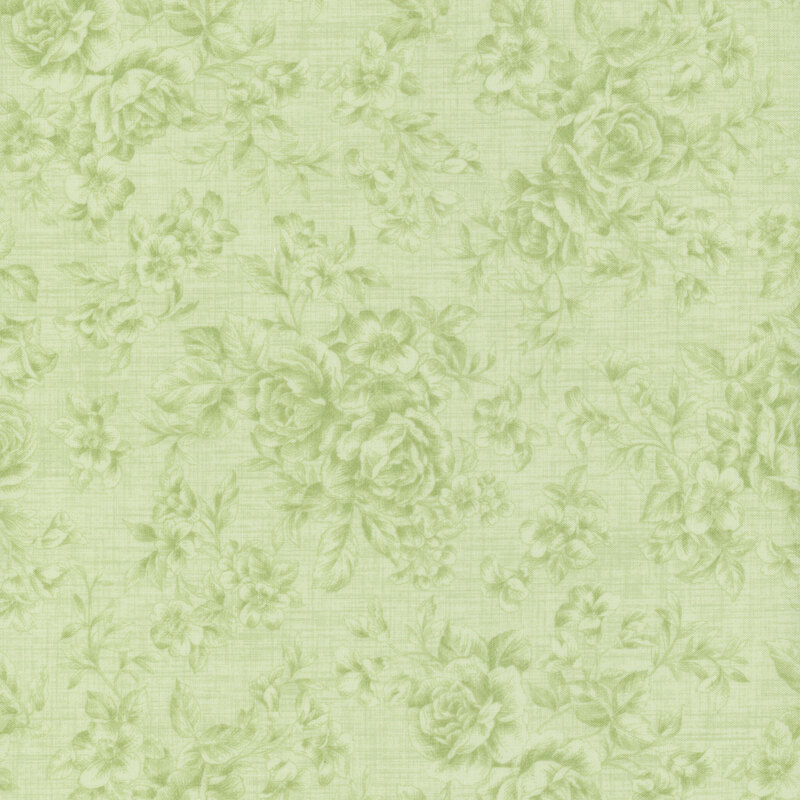Tonal floral fabric pattern with a light green background, featuring roses and various small flowers.