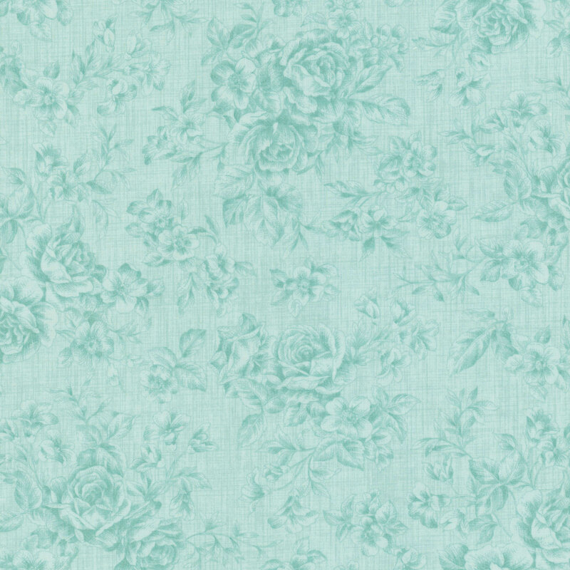 Tonal floral fabric pattern with a blue background, featuring roses and various small flowers.
