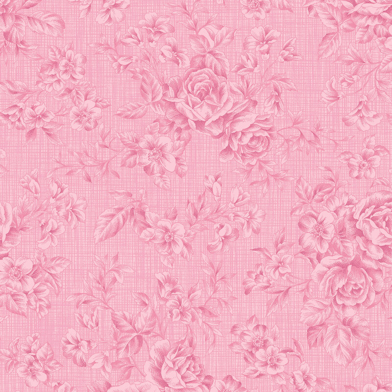 Tonal floral fabric pattern with a pink background, featuring roses and various small flowers.