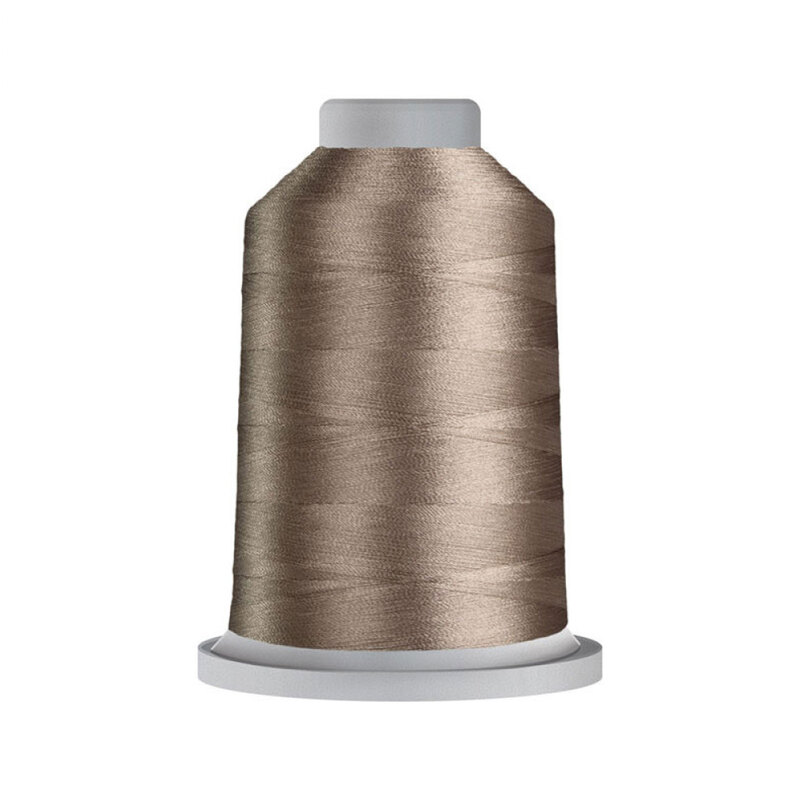 A spool of brown Glide Machine Embroidery Thread