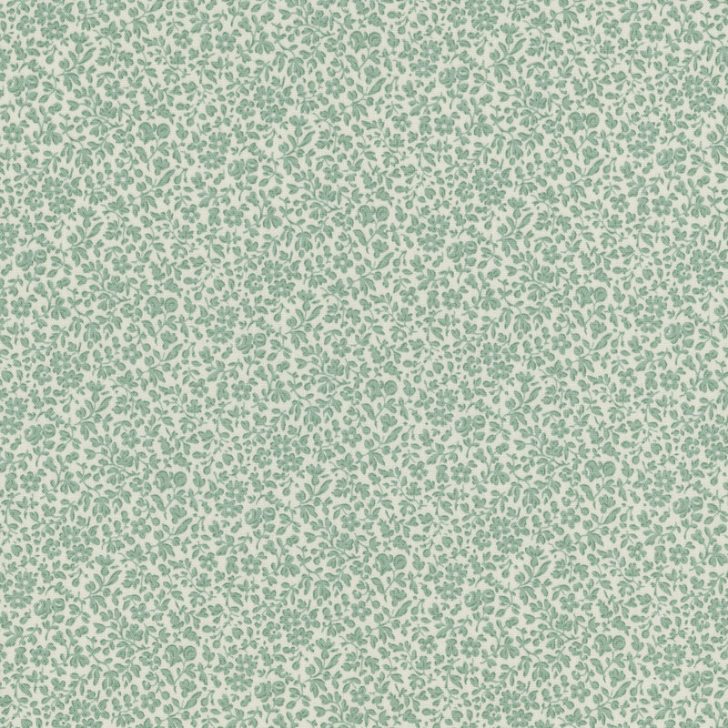 A green and beige patterned fabric with small leaf-like shapes.