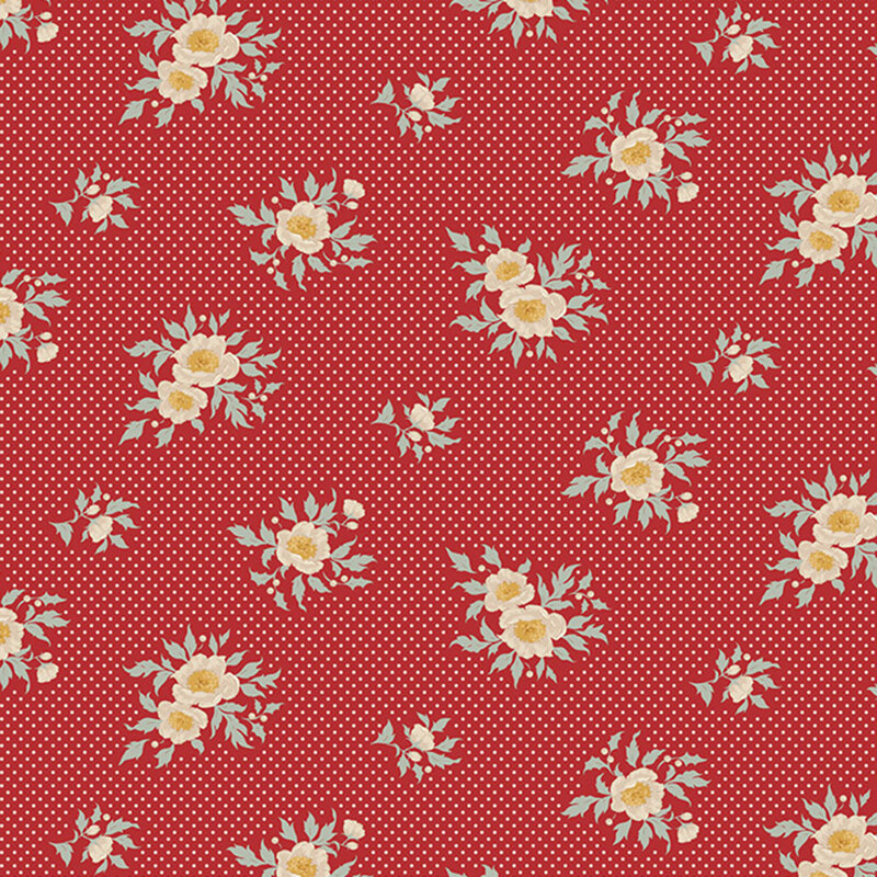 Red fabric with a floral pattern featuring yellow roses and green leaves over a polka dot background.
