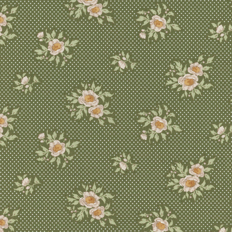 Green fabric with a floral pattern featuring yellow and white flowers on a dotted background.
