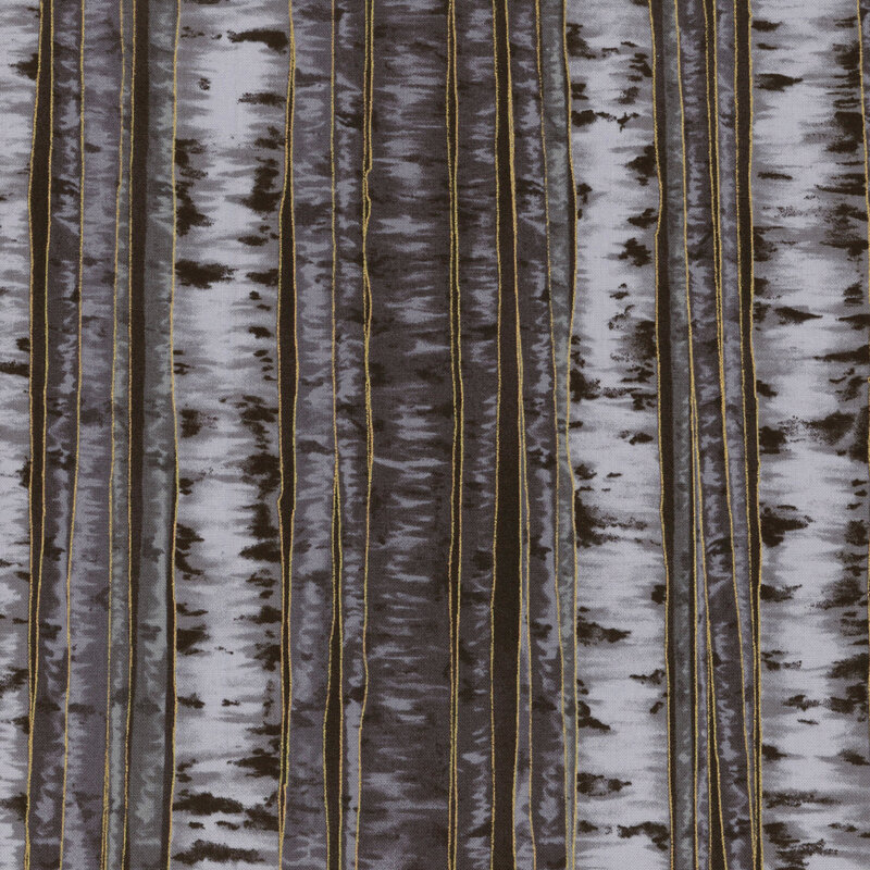 Black fabric featuring a forest of birch trees with gold metallic accents.