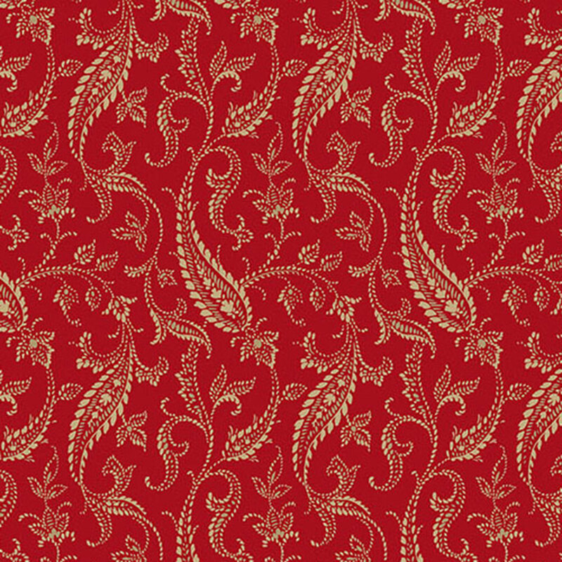 fabric pattern of a tan paisley on a red background