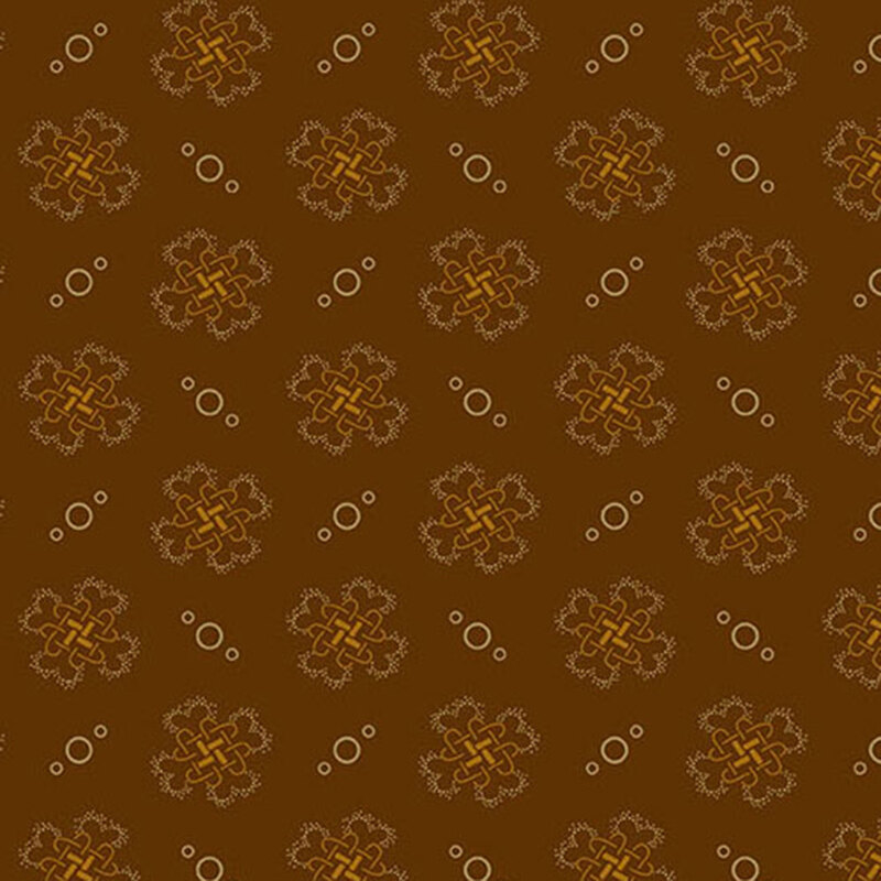 fabric pattern of golden threads of knots and circles on a brown background