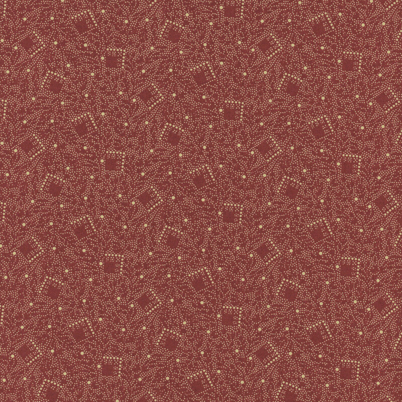 fabric patterns of motif squares on a rust red background