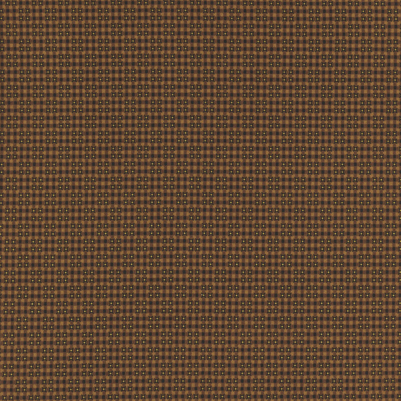 fabric pattern of tiny squares and small dots on a brown background