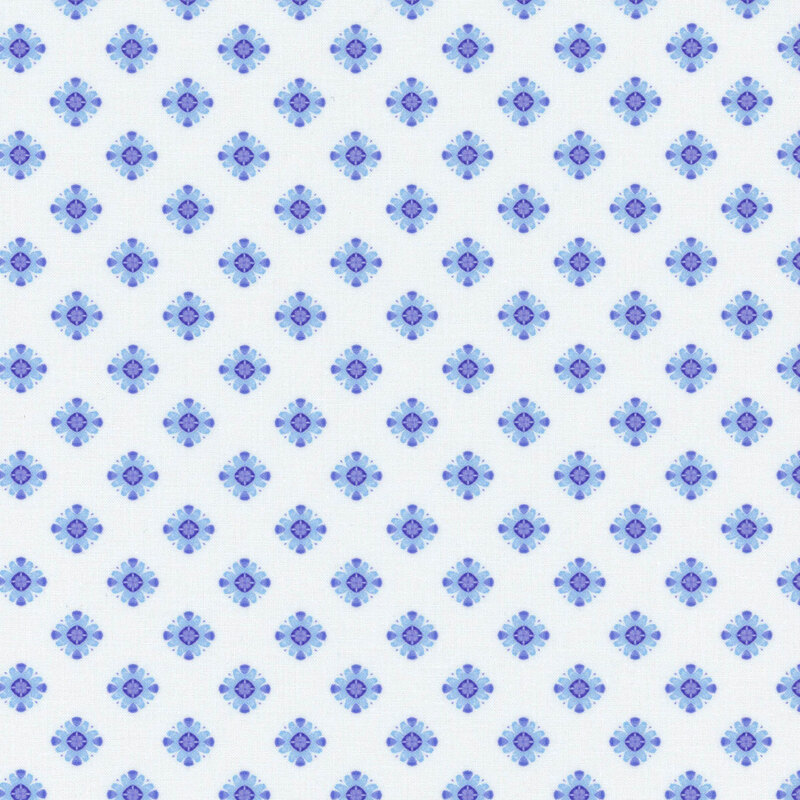 White fabric with a lattice design made up of blue floral diamonds.