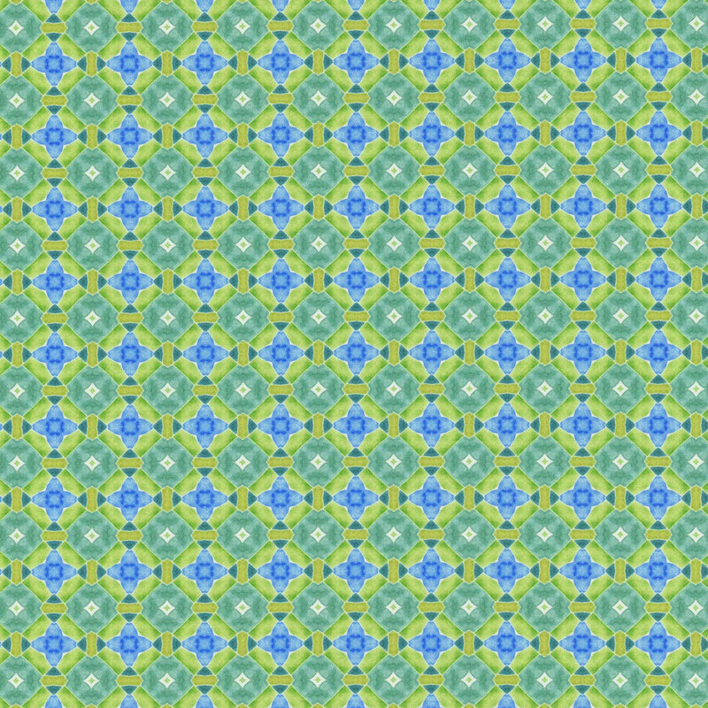 Green fabric with a blue and teal geometric pattern.